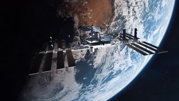 International Space Station Medium Establishing Shot with Planet Earth