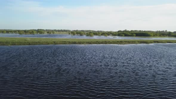 A Rural Field Flooded with Water in Spring Time