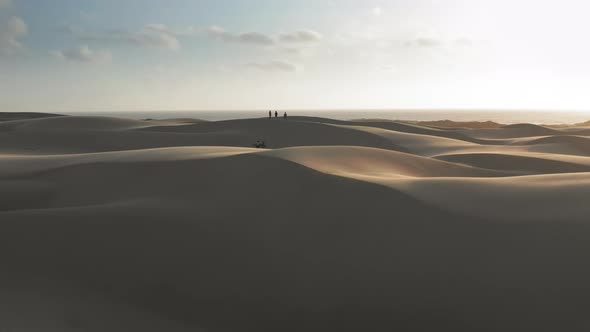  Slow Motion Aerial View of People Walking By the Sand Dunes, California Nature alt