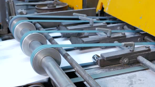 Industrial process of making envelopes in a factory alt