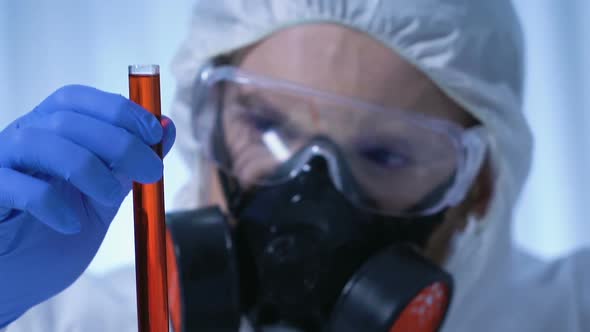 Expert Examining Flask With Toxicological Substance, Disease Control Center alt