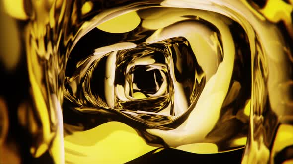 Golden metallic liquid flowing in weightlessness alt