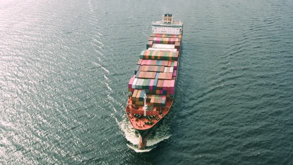 Container Vessel Floating in Sea alt