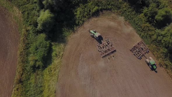 Drone Shooting of Tractors Cultivating Agricultural Land.
