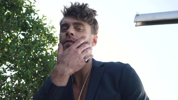 Man Holding His Chin and Posing alt