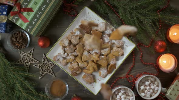 Christmas Cookies Fall on the Table in Slow Mo. Christmas Time. alt