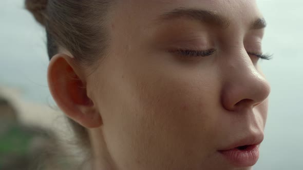 Face Woman Making Breathing Exercise on Beach Closeup alt