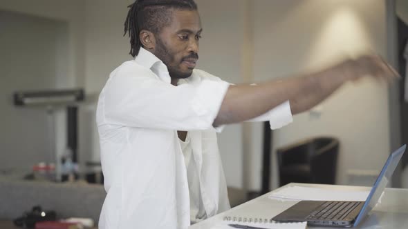 Stressed Young Man Holding Head Hands Closing Laptop alt
