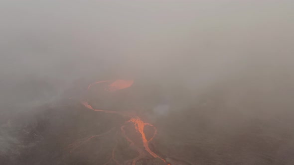 Smoke Rising From Lava Flow During Volcanic Eruption. aerial alt
