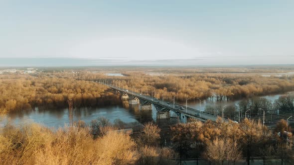 Horizontally the Video Shows a River Flowing Through Which a Bridge is Thrown From the Side on Which