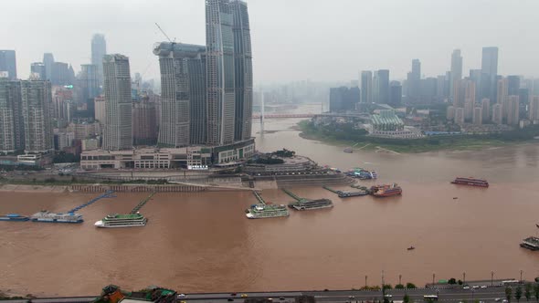 Chongqing City River Cityscape with Bridges Aerial China Timelapse Pan Up alt