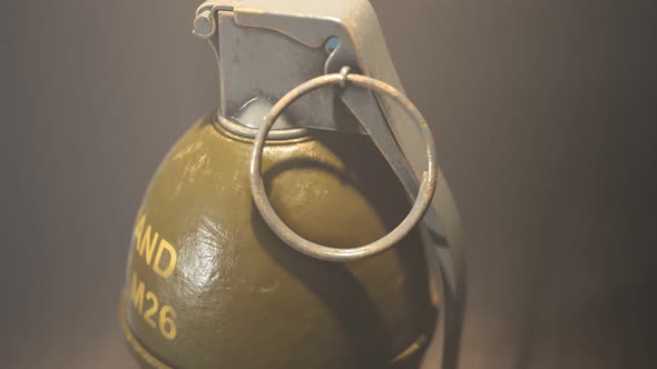 Zooming-out animation of a single lemon grenade in the dark background. 4KHD alt