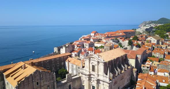 Old City Footage From Air, Drone Goes Above Church and Other Red-tiled Buidlings, Dubrovnik, Croatia
