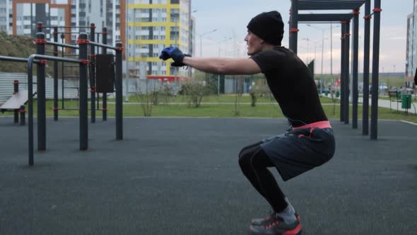 Man training outdoors on sports field