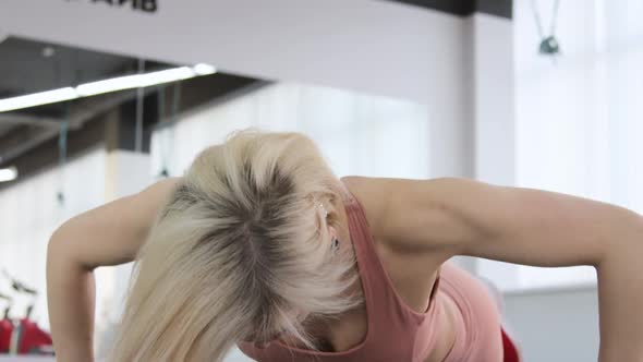 Young woman training in a sports club