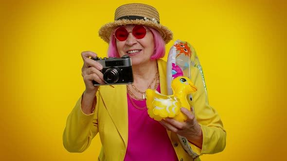 Elderly Woman Grandmother Tourist Photographer Taking Photos on Camera Travel Holiday Vacations alt