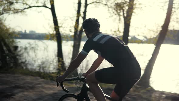 Hard Sport Bike Workout. Triathlete Cyclist Training On Bicycle. Fit Athlete Sport Workout Training. alt