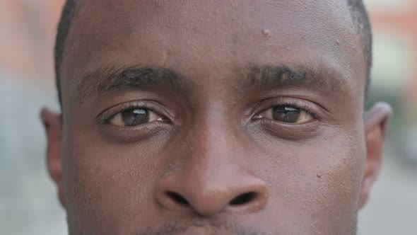 Close Up of Blinking Eyes of African Man, Stock Footage | VideoHive