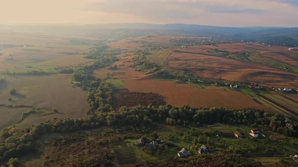 Sunset over the fields of western Ukraine. Aerial view.