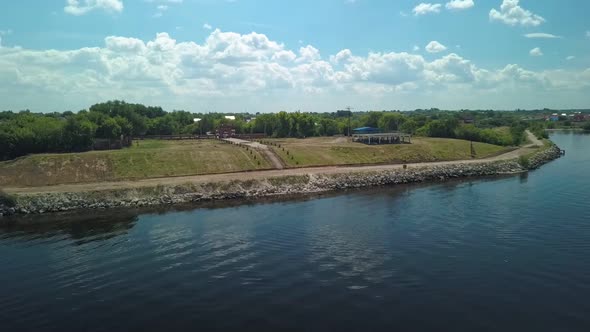 Aerial View of Landscape with Old Quay on Shore of River, Historical Ruins