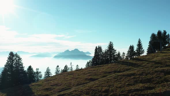 couple looking at beautiful scenery with fog covered mountains and lake, relationship goals swiss al alt
