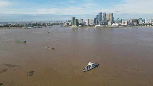 Aerial view of Phnom Penh along the riverside, Cambodia. alt