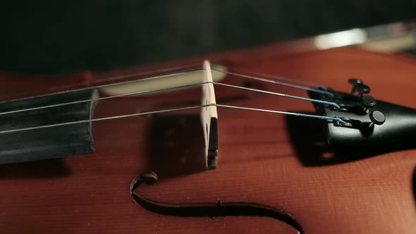 Part of Aged Violin On Black Background