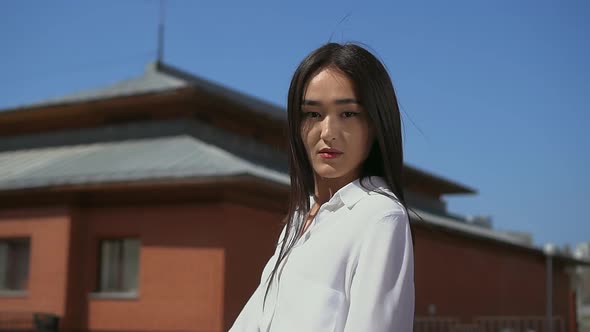 Malaysian Beauty Unfolds, Waving Long Dark Hair alt