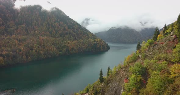 Mountain lake in the clouds. Aerial alt