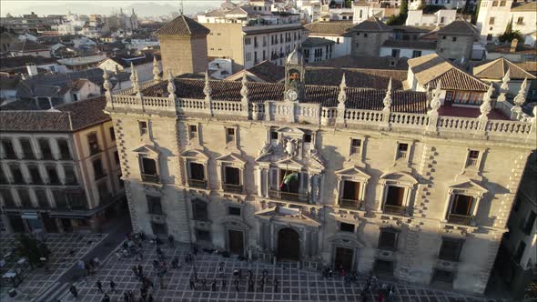 Aerial circle view of the main façade of the Cathedral of Granada with people in front. Spain