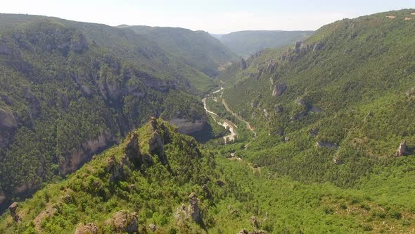 Aerial travel drone view of Gorges du Tarn and the Tarn River, Southern France. alt