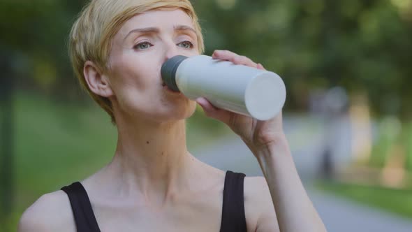 Female Portrait Outdoors Close Up Caucasian Middleaged Mature Woman 40s Lady Trainer Runner Stand in alt