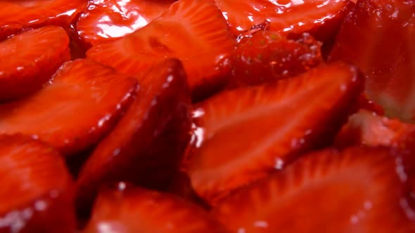 Close Up of a Sweet Red Strawberry Slices on a Pie alt
