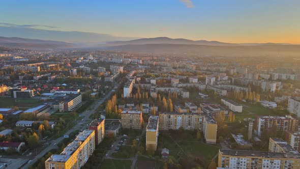 Drone Aerial View of the Foggy During Sunrise View in the Residential Area on Uzhhorod City alt