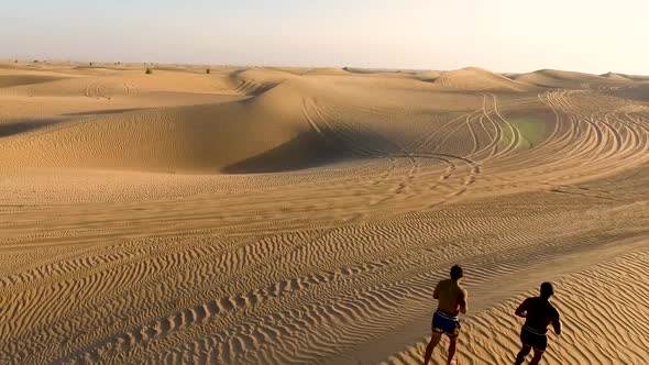 Athletes Run in the Desert