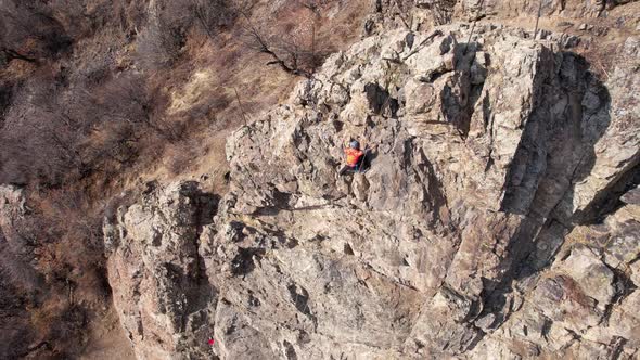Rock Climbing Training on Steep Slope in Mountains alt