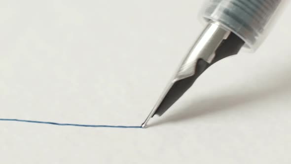 Pen Writes Line On Paper alt