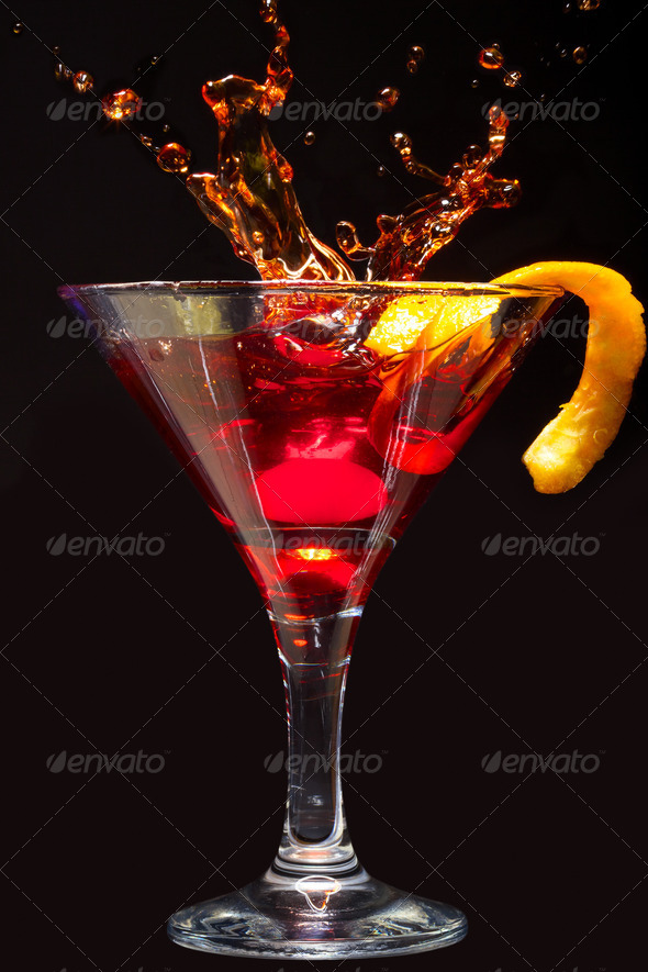 Splashing Cosmopolitan Cocktail - Stock Photo - Images