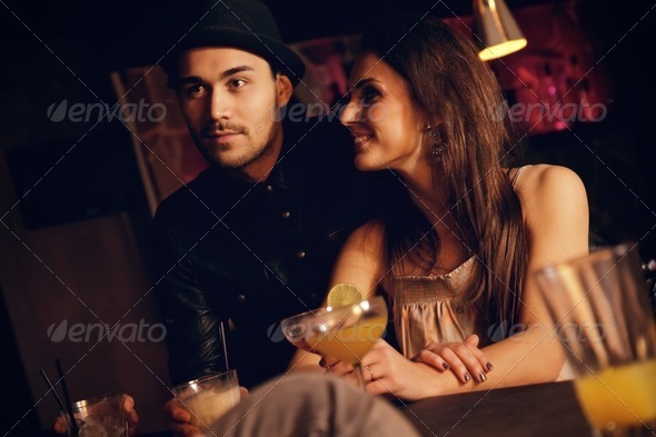 Young Couple Enjoying Their Date with Friends