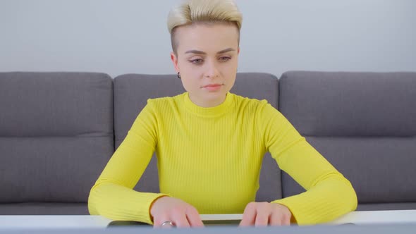 Freelancer woman working from home during lockdown in 4k stock footage alt