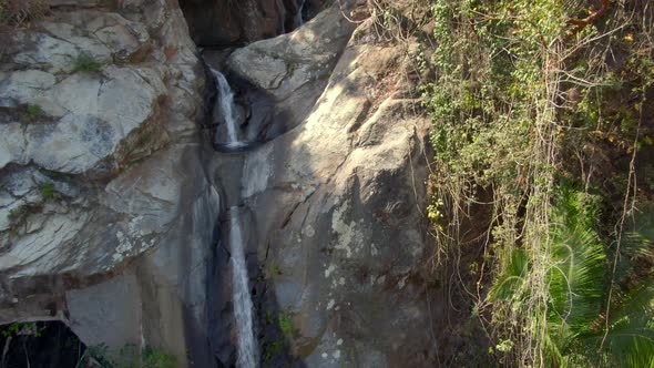 Steep Rocky Mountain In Tropical Forest With Cascade - Cascada de Yelapa In Jalisco, Mexico. Aerial alt