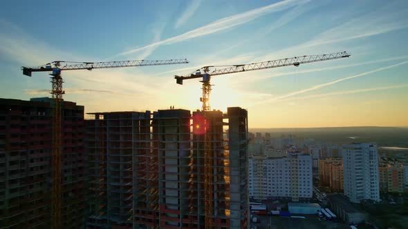 Construction cranes in operation alt