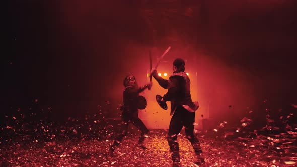 Sword fight in the circus arena with beautiful red lighting in the fog, flying confetti, slow motion