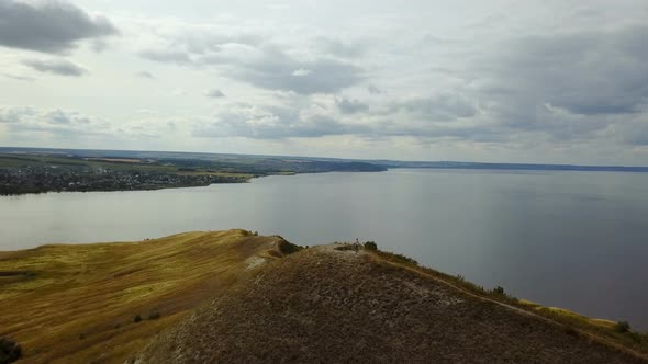 Girl Walks up the Hill and Sea Bay