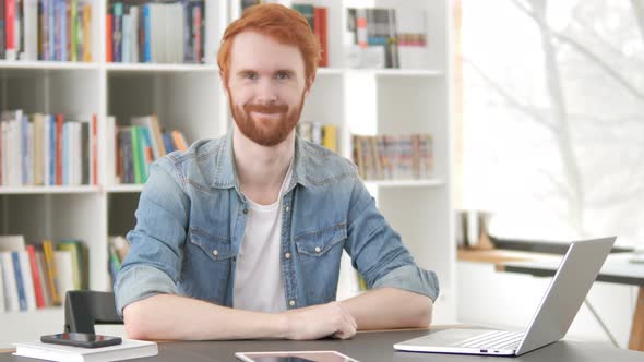 Yes, Casual Redhead Man Accepting Offer at Work alt