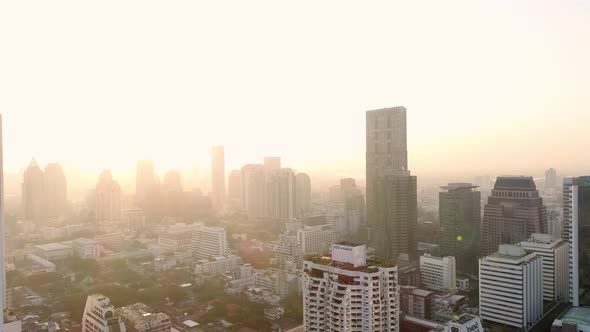 4k Aerial city view of Bangkok dowtnown, Flying over Bangkok, Thailand. alt