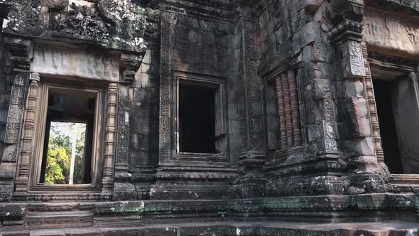 Close Exterior Panning Shot of the Doors and Windows with Carved  and Decorated Frames of Ancient Te alt