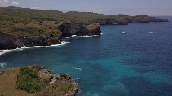 Calmer aerial view flight panorama overview drone shot ofBroken Beach at Nusa Penida in Bali Indone alt