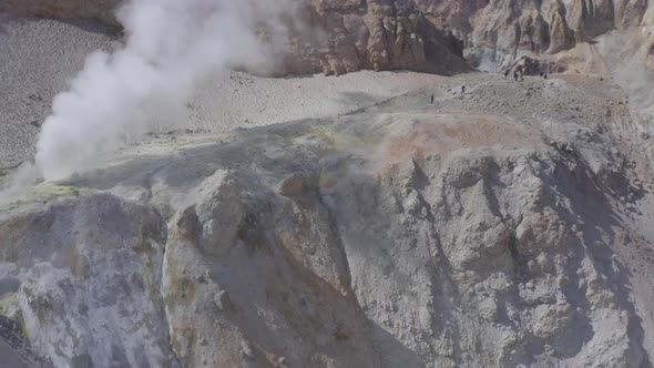 Aerial Drone Footage of Mutnovsky Volcano Crater with Fumaroles and Glacier