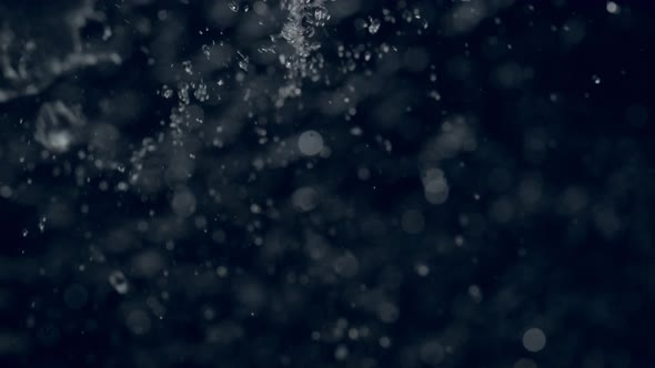 4K 30fps, Heavy rain in puddle, Slow Motion alt